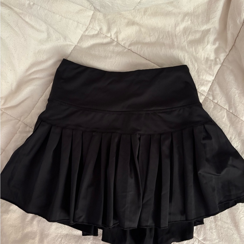 3 pack of amazon athletic skirts with built in shorts.
